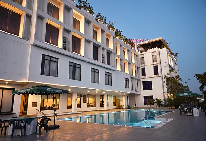 Emerald Garden Club exterior and pool courtyard
