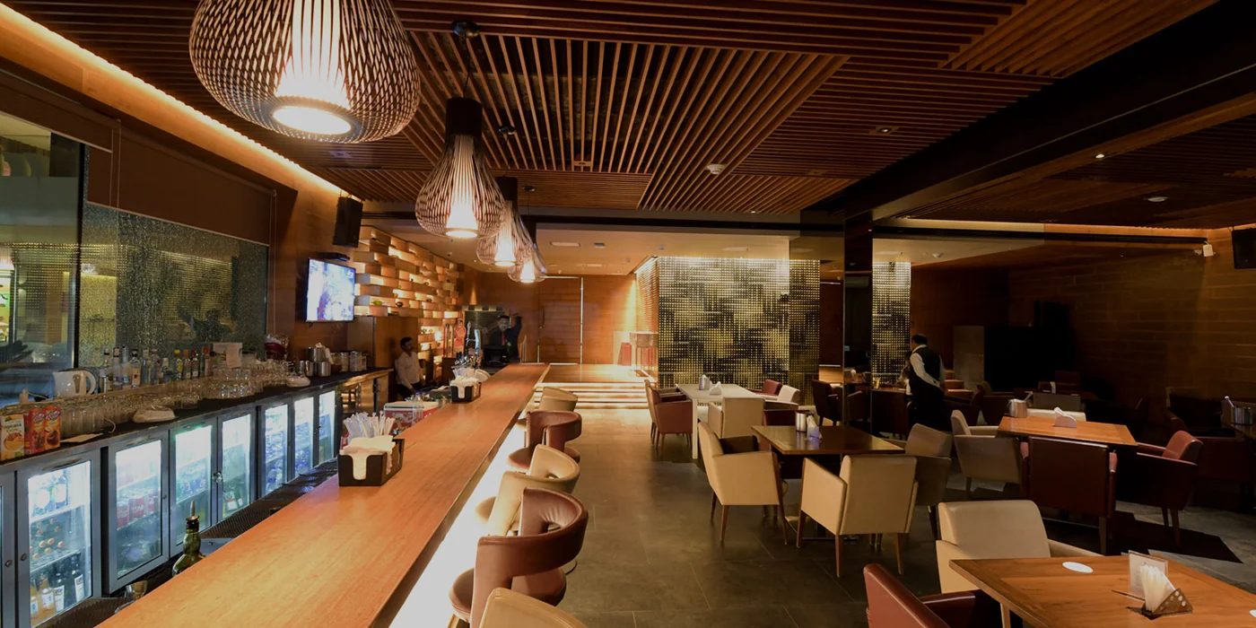 Dining and bar interior at Otters Club