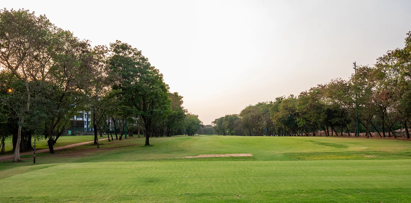 Tree-lined grounds at The Poona Club